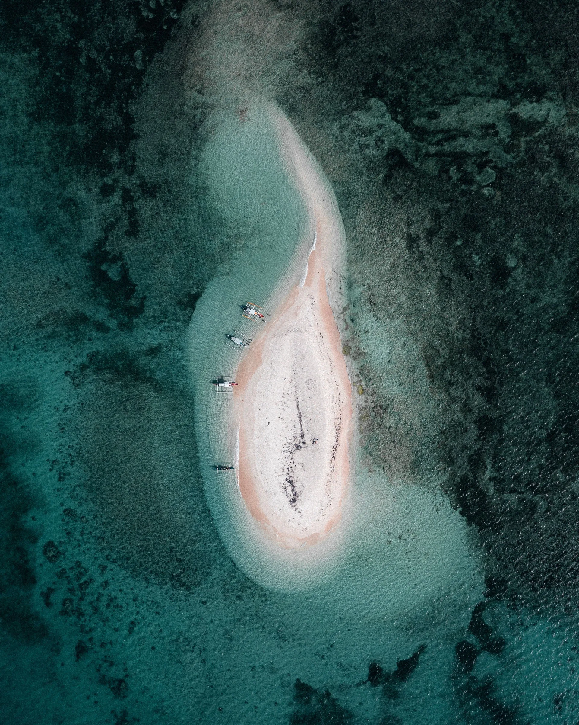 Reef, sandbar and open ocean from above